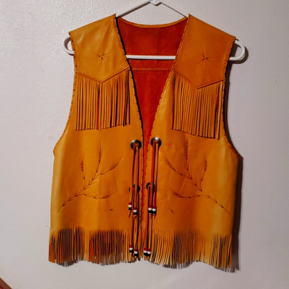 Beautifully detailed leather fringed vest.
